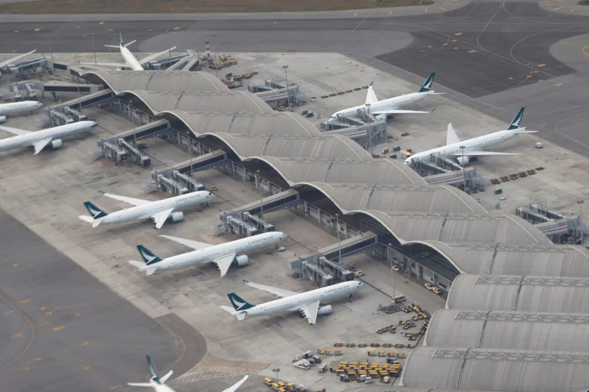 Cathay Pacific planes are parked on the tarmac at Hong Kong International Airport, Hong Kong, on Oct. 24 2020. (Tyrone Siu/Reuters)
