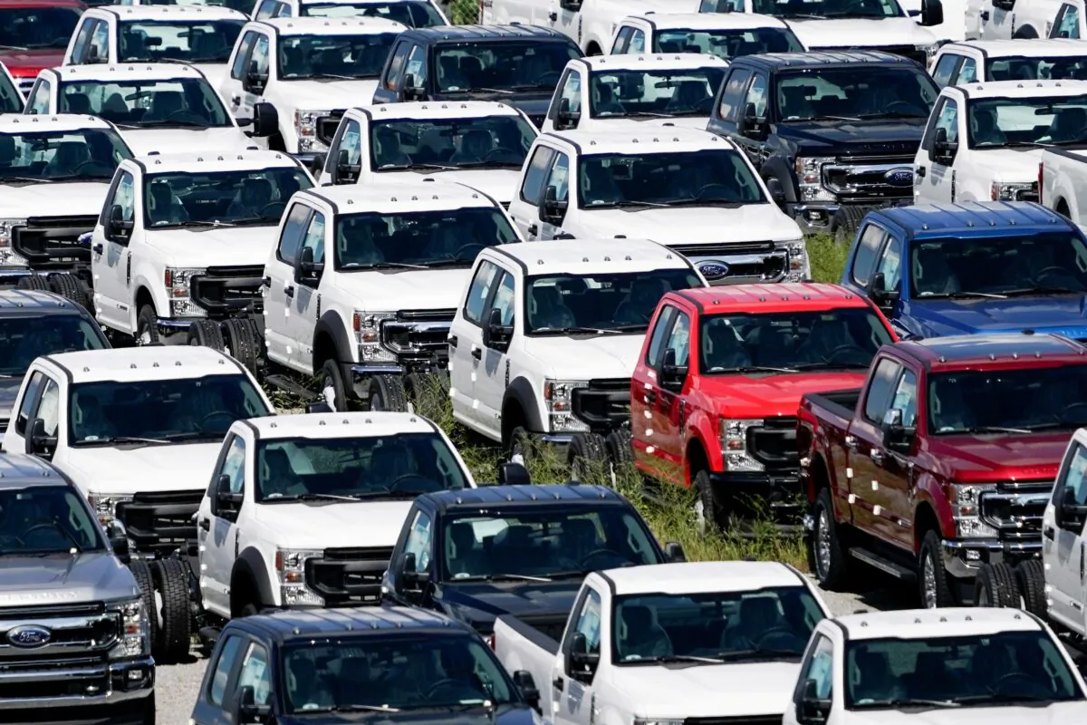 Thousands of Ford F-150s without chips are stored at Kentucky Speedway in Sparta, Ky., on Sept. 8, 2021. (Jeff Dean/Reuters)