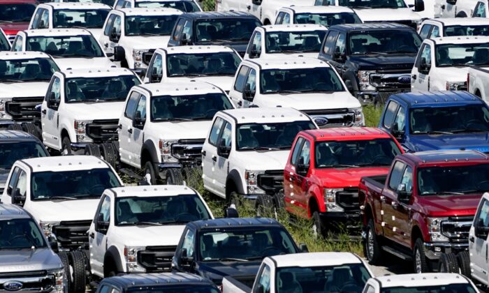 Thousands of Ford F-150s without chips are stored at Kentucky Speedway in Sparta, Ky., on Sept. 8, 2021. (Jeff Dean/Reuters)