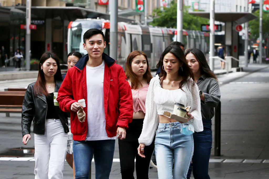 Pedestrians move along George Street in the CBD in Sydney, Australia, on Nov. 8, 2021. (Lisa Maree Williams/Getty Images)