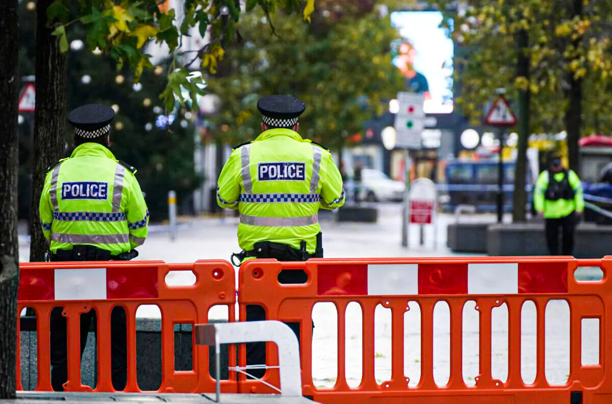 Police cordon off an area after schoolgirl Ava White is stabbed to death in Liverpool city centre, on Nov. 26, 2021. (PA)