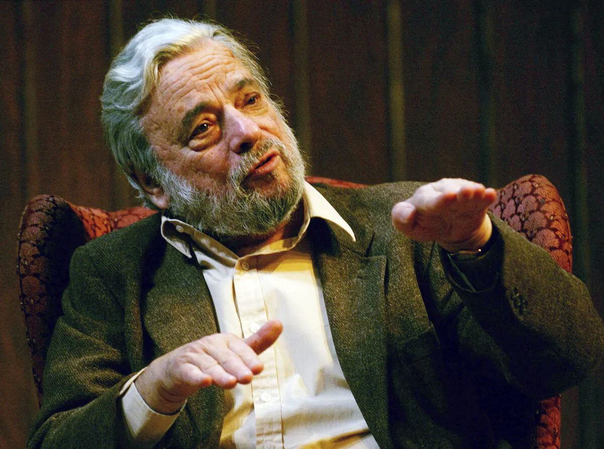 Composer and lyricist Stephen Sondheim gestures during a gathering at Tufts University in Medford, Mass., on April 12, 2004. (Charles Krupa/AP Photo)