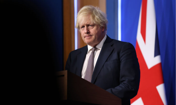 UK Prime Minister Boris Johnson speaks during a press conference after cases of the new COVID-19 variant were confirmed in the United Kingdom in London on Nov. 27, 2021. (Hollie Adams/Getty Images)