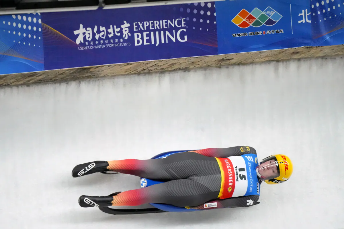 Anna Berreiter of Germany competes during the women's race at the Luge World Cup, a test event for the 2022 Winter Olympics, at the Yanqing National Sliding Center in Beijing, on Nov. 21, 2021. (Mark Schiefelbein/AP Photo)