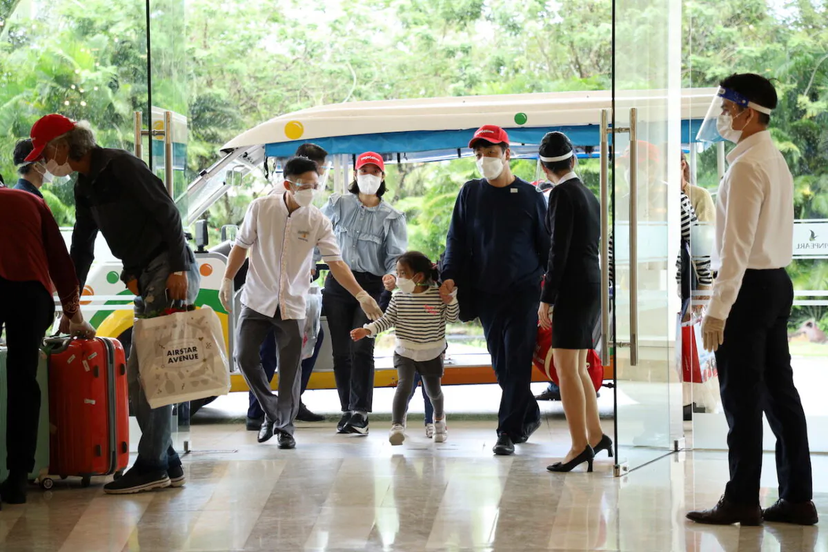 South Korean tourists arrive at a hotel in Phu Quoc island, in Vietnam, on Nov. 20, 2021. (Vinpearl/Handout via Reuters)