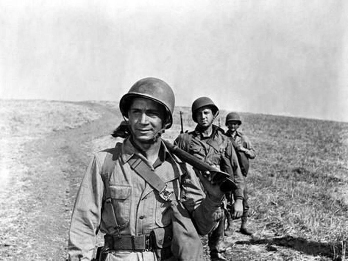 A U.S. World War II platoon making its way across Italian countryside, in “A Walk in the Sun.” (20th Century Fox)