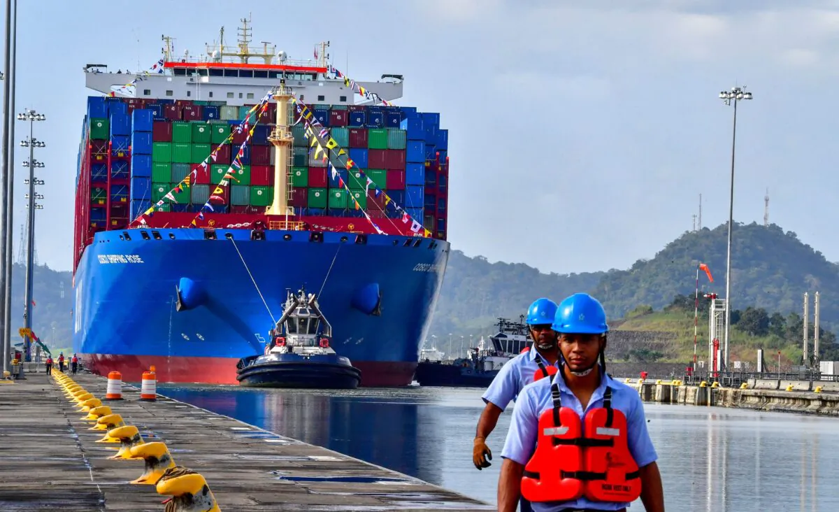 Chinese Cosco Shipping Rose container ship sails near the new Cocoli locks, in the Panama Canal, Panama, on Dec. 3, 2018. (Luis Acosta/AFP via Getty Images)