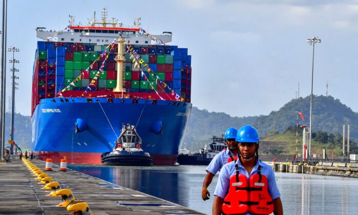Chinese Cosco Shipping Rose container ship sails near the new Cocoli locks, in the Panama Canal, Panama, on Dec. 3, 2018. (Luis Acosta/AFP via Getty Images)