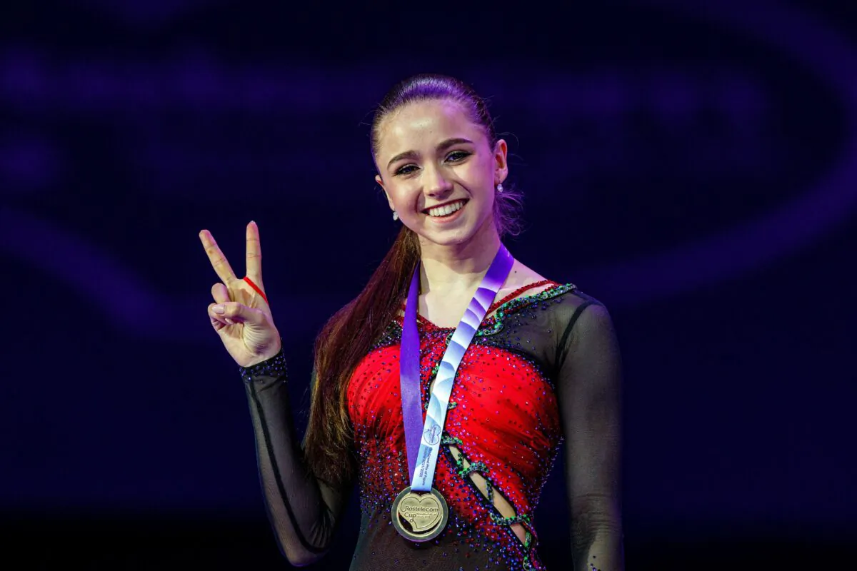 Russia's Kamila Valieva poses as she celebrates winning the gold medal for the women's competition at the Rostelecom Cup 2021 ISU Grand Prix of Figure Skating in Sochi, Russia, on Nov. 28, 2021. (Dimitar Dilkoff/AFP via Getty Images)