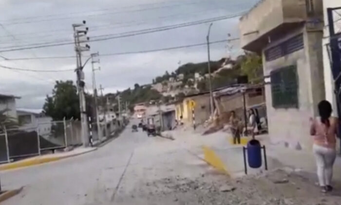 A view of debris on a street after an earthquake, in Bagua, Peru, on Nov, 28, 2021, in this still from video. (AP)