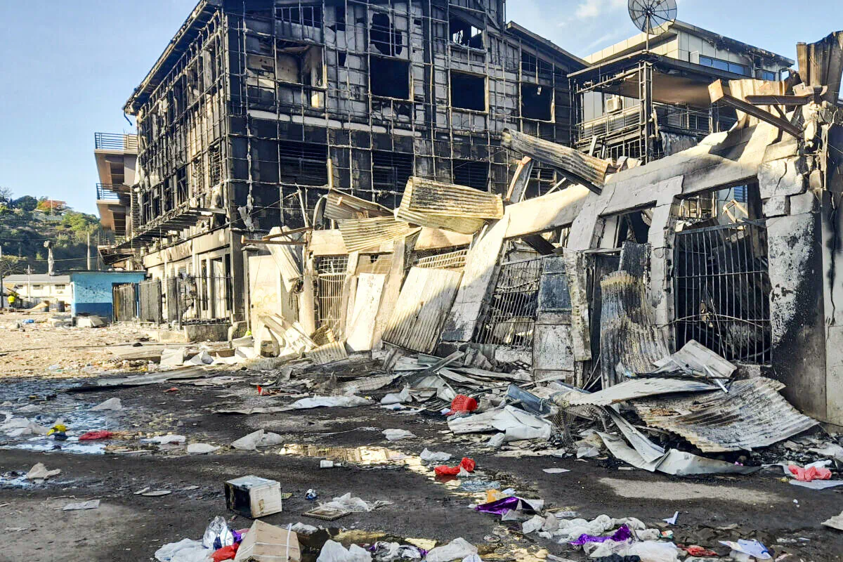 This photo shows aftermath of a looted street in Honiara's Chinatown, Solomon Islands, on Nov. 27, 2021. (Piringi Charley/AP Photo)