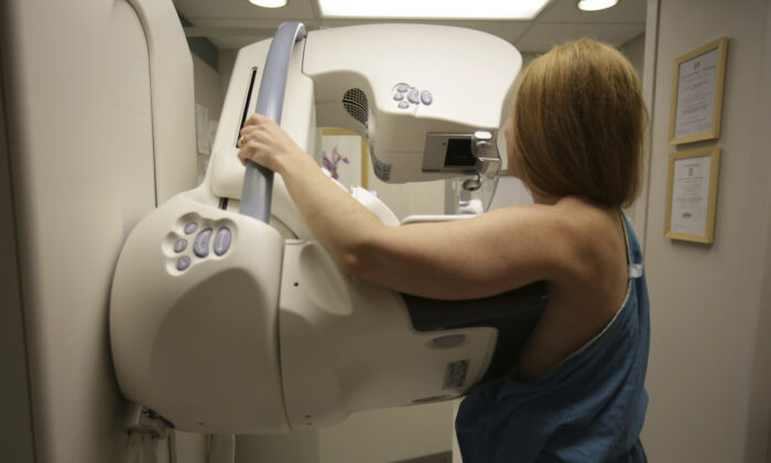 A woman gets a mammogram at the University of Michigan Cancer Center in Ann Arbor, Mich., on May 22, 2015. (Detroit Free Press via AP, File/Kimberly P. Mitchell)
