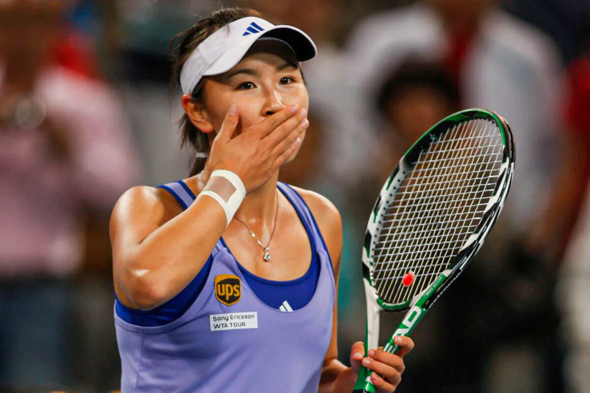 Chinese tennis player Peng Shuai reacts during a tennis match in Beijing on Oct. 6, 2009. (Ng Han Guan/AP Photo)