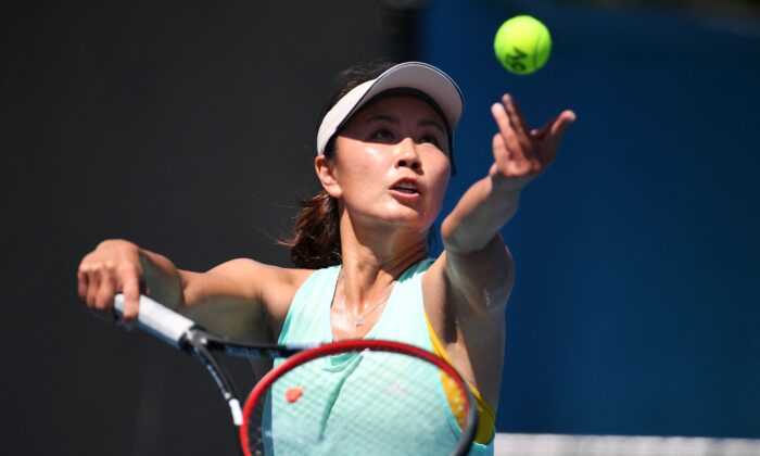 China's Peng Shuai serves the ball during a practice session ahead of the Australian Open tennis tournament in Melbourne on Jan. 13, 2019. (William West/AFP via Getty Images)