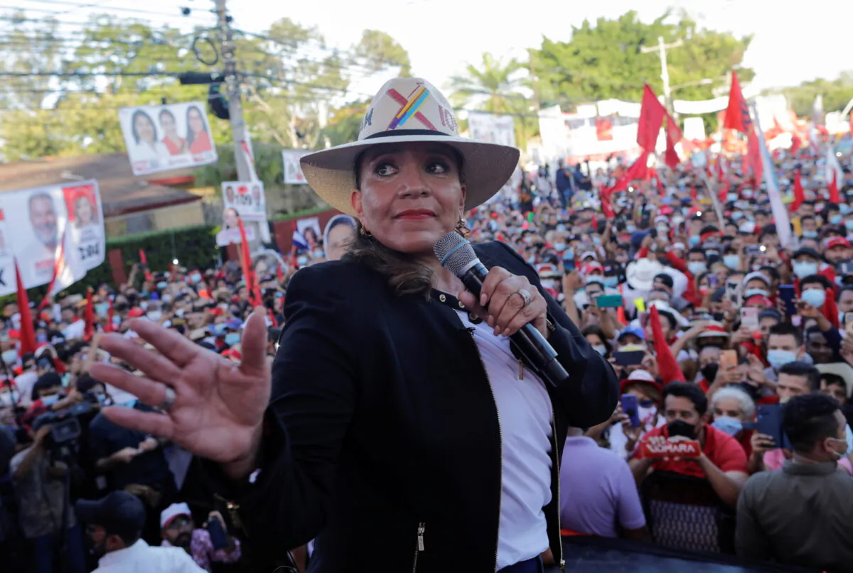 Xiomara Castro, presidential candidate for the leftist opposition Libre Party, addresses supporters during the closing rally of her electoral campaign in San Pedro Sula, Honduras, on Nov. 20, 2021. (Yoseph Amaya/Reuters)