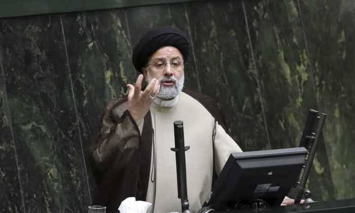 Iranian leader Ebrahim Raisi addresses parliament in Tehran, Iran, on Nov. 16, 2021. (Vahid Salemi/AP Photo)