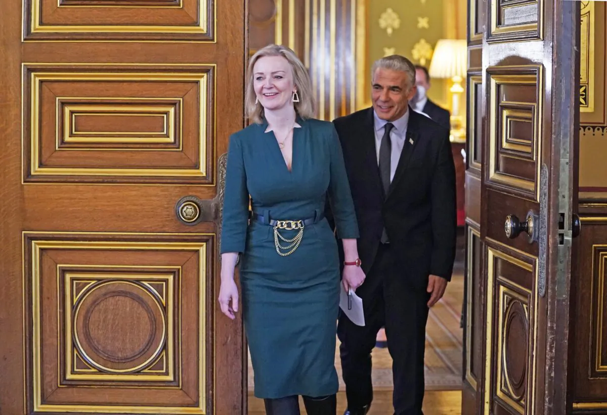 UK Foreign Secretary Liz Truss (L) with Israeli Foreign Minister Yair Lapid ahead of a meeting at the Foreign Office in London on Nov. 29, 2021. (PA)