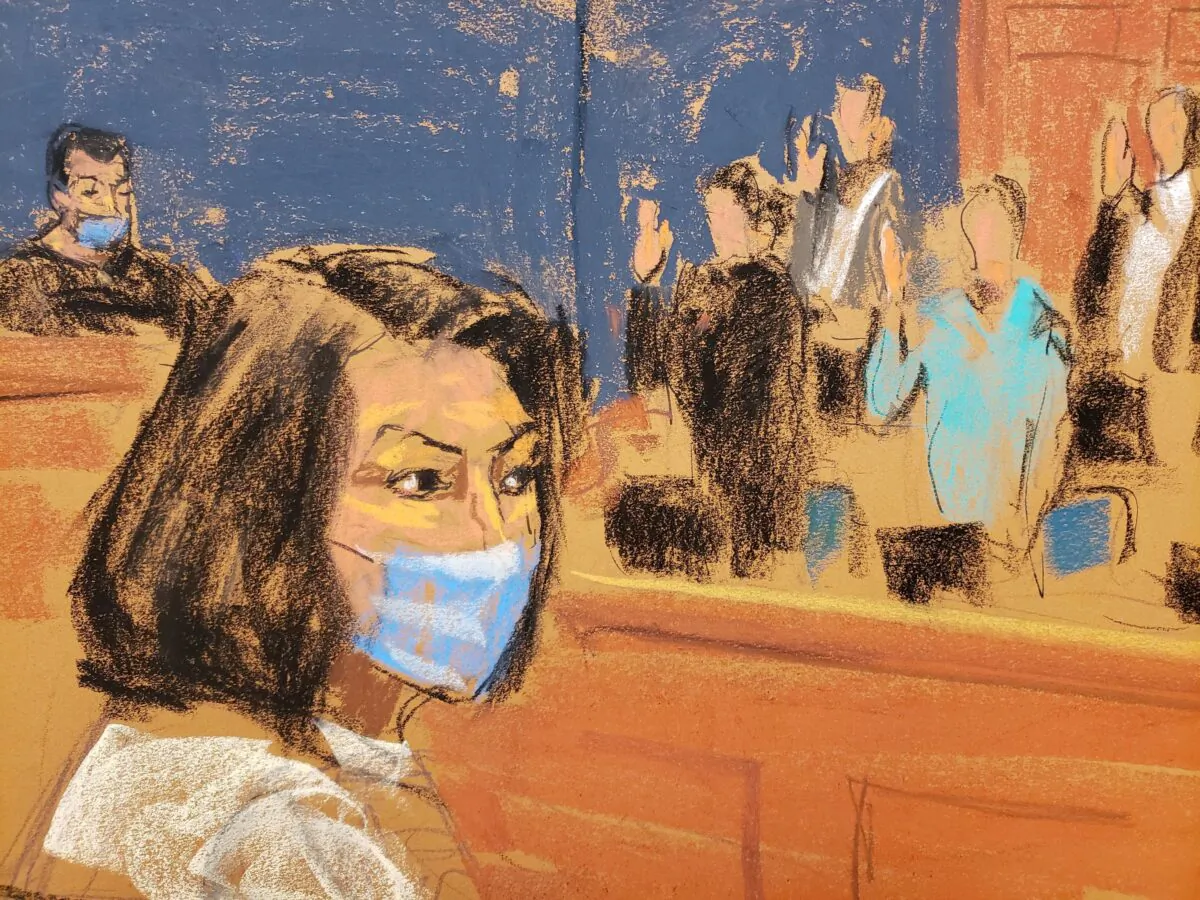 Ghislaine Maxwell sits as the jurors are sworn in at the start of her trial on charges of sex trafficking, in a courtroom sketch in New York City on Nov. 29, 2021. (Jane Rosenberg/Reuters)