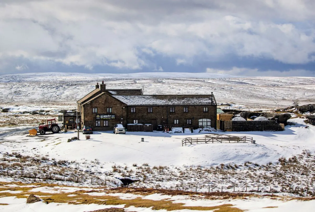 The Tan Hill Inn, following fresh snow fall, in Richmond, Yorkshire Dales, England, on March 13, 2021. (PA via AP)