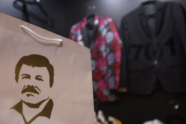 A paper bag with the image of Mexican drug lord Joaquin "El Chapo" Guzman is seen at a stand of the clothing brand "El Chapo 701" at the Intermoda fair in Guadalajara