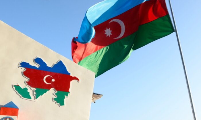 The Azerbaijani flag will be seen in the village of Zengilan in Azerbaijan on January 5, 2021.  (Tofik Babayev / AFP via Getty Images)