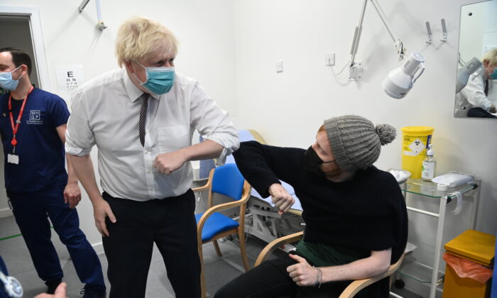 British Prime Minister Boris Johnson visits Lordship Lane Primary Care Centre in London, on Nov. 30, 2021. (Paul Grover-WPA Pool/Getty Images)