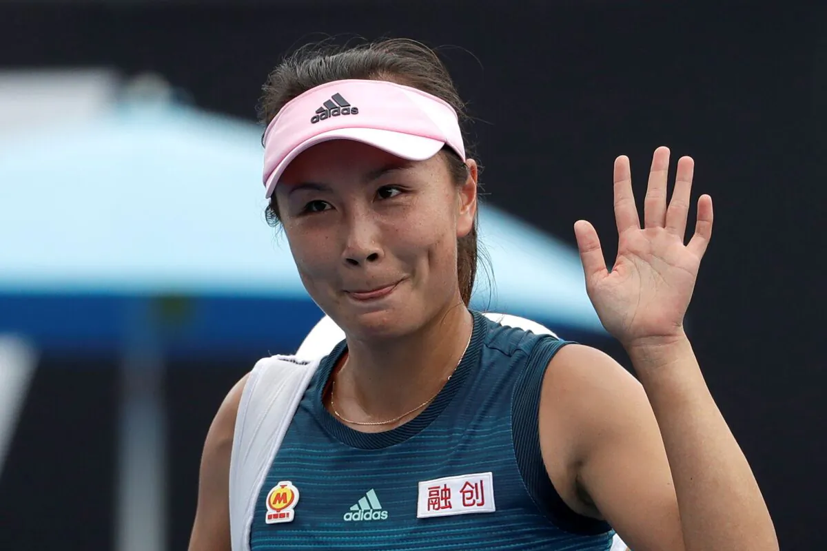 Peng Shuai waves at the Australian Open tennis championships in Melbourne, Australia, on Jan. 15, 2019. (Mark Schiefelbein/AP Photo)