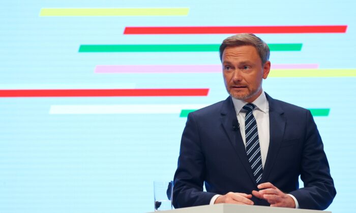 Free Democratic Party (FDP) leader Christian Lindner delivers a statement after a final round of coalition talks to form a new government, in Berlin, Germany, on Nov. 24, 2021. (Fabrizio Bensch/Reuters)