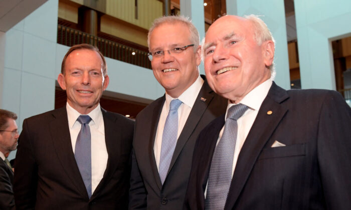 Prime Minister Scott Morrison (C) with former Prime Ministers Tony Abbott and John Howard (R) after leaving the Senate at Parliament House in Canberra, Australia, on July 2, 2019. (Tracey Nearmy/Getty Images)