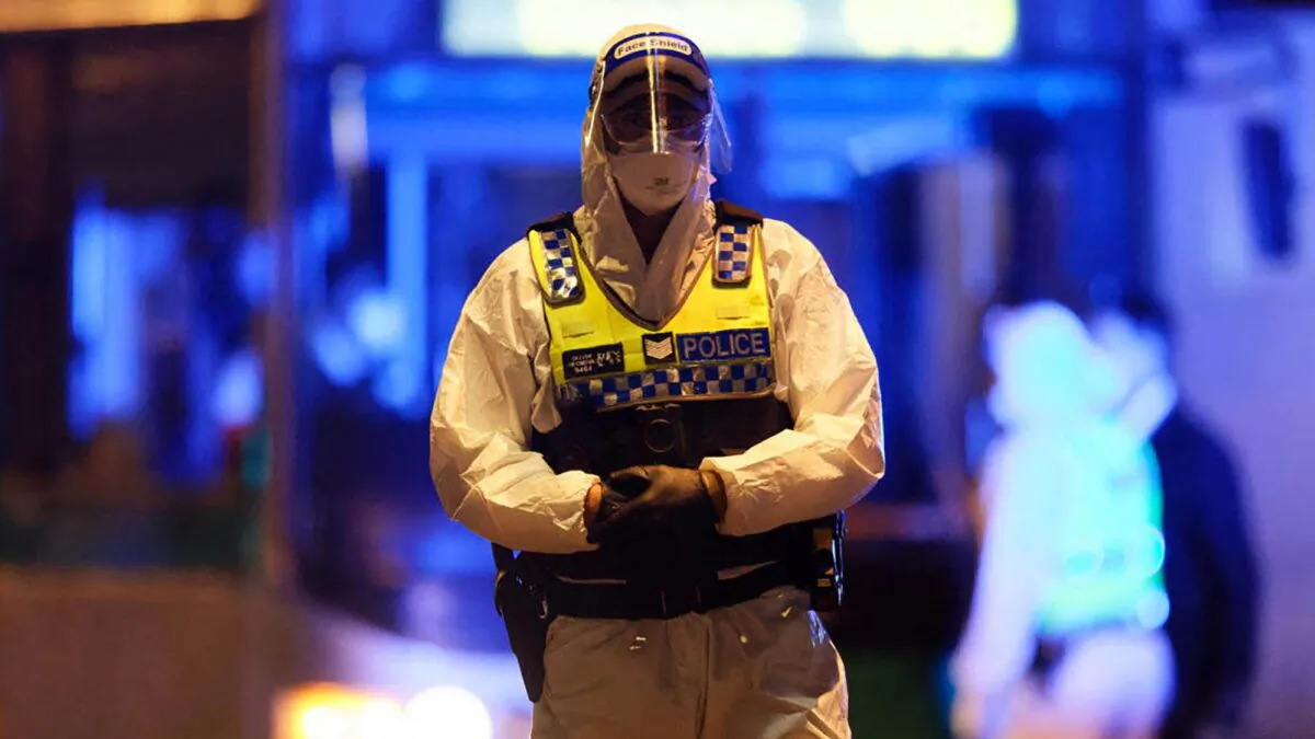 A Western Australia police officer wearing protective gear in Perth, Australia on Aug. 20, 2021. (TREVOR COLLENS/AFP via Getty Images)
