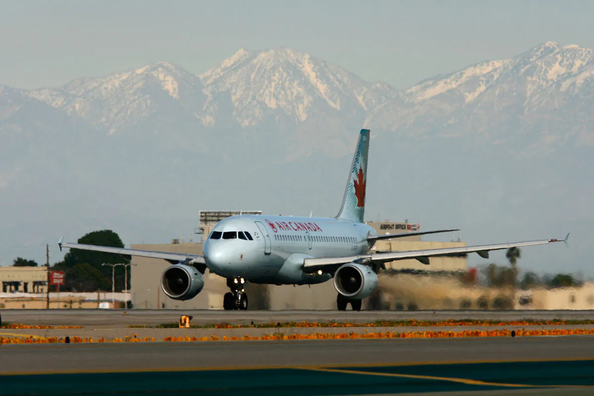 An Air Canada jet lands at Los Angels International Airport in Los Angeles on Feb. 26, 2008. (David McNew/Getty Images)