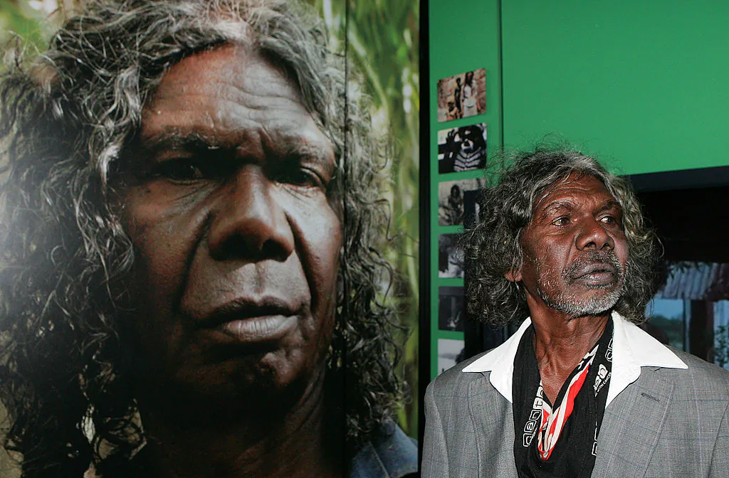 Actor David Gulpilil poses for photographers at the 'Screen Worlds: The story of film, television and digital culture' exhibition opening at Federation Square in Melbourne, Australia, on Sept. 17, 2009. (Scott Barbour/Getty Images)