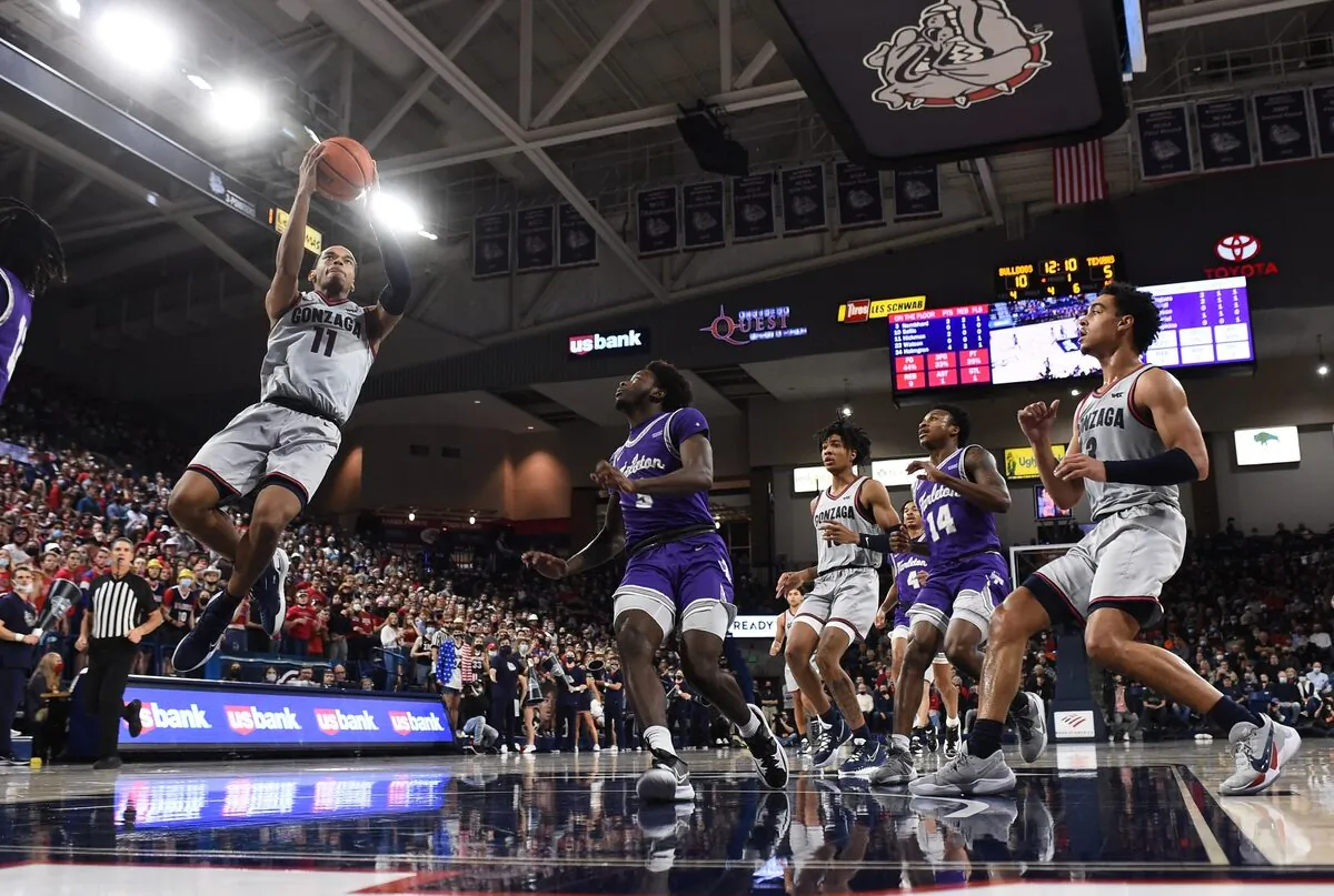 Gonzaga Bulldogs guard Nolan Hickman (11) shoots the ball against Tarleton State Texans guard Shamir Bogues (3) in the first half at McCarthey Athletic Center in Spokane, Wash., on Nov 29, 2021. (James Snook/USA TODAY Sports via Field Level Media)