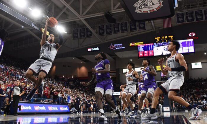 Gonzaga Bulldogs guard Nolan Hickman (11) shoots the ball against Tarleton State Texans guard Shamir Bogues (3) in the first half at McCarthey Athletic Center in Spokane, Wash., on Nov 29, 2021. (James Snook/USA TODAY Sports via Field Level Media)