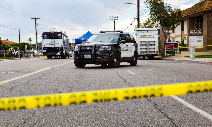 Police investigate the scene of a shooting in Orange, Calif., on April 1, 2021. (John Fredricks/The Epoch Times)