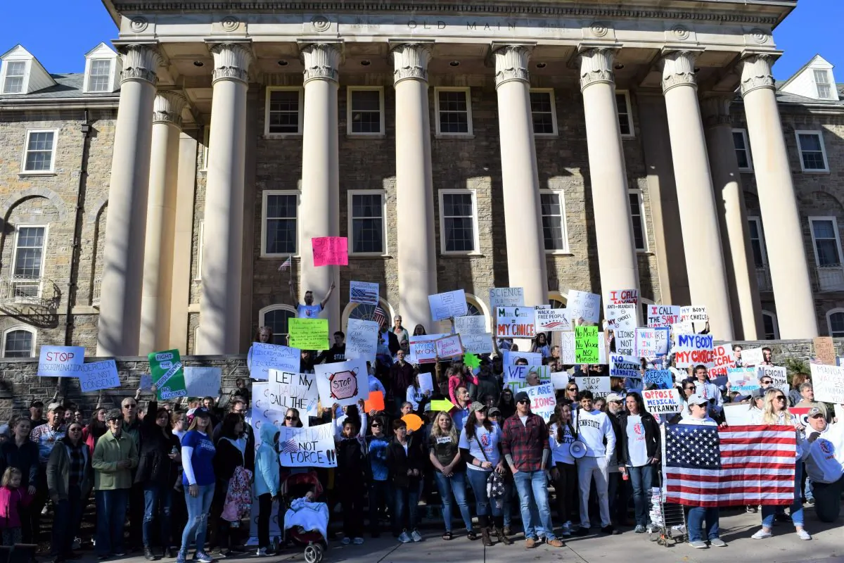 Penn State employees gathered for a health freedom rally in front of Old Main on Penn State’s campus, on Nov. 12, 2021. (Beth Brelje/The Epoch Times)
