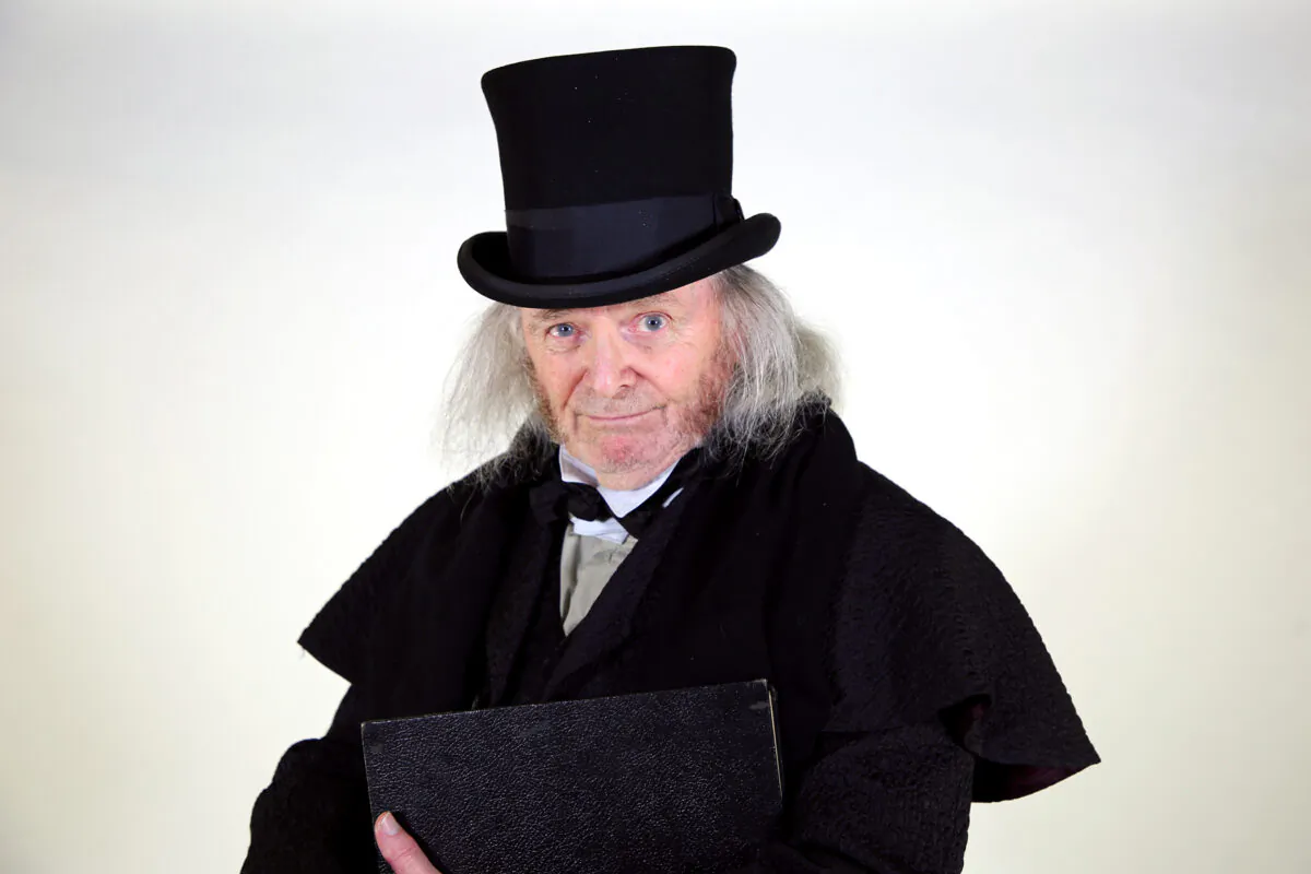 Richard Doyle plays Ebenezer Scrooge in A Christmas Carol by Charles Dickens adapted by Jerry Patch and directed by Hisa Takakuwa, at South Coast Repertory in Costa Mesa, Calif., from Nov. 27 to Dec. 26, 2021. (Nicholas Pilapil/SCR)