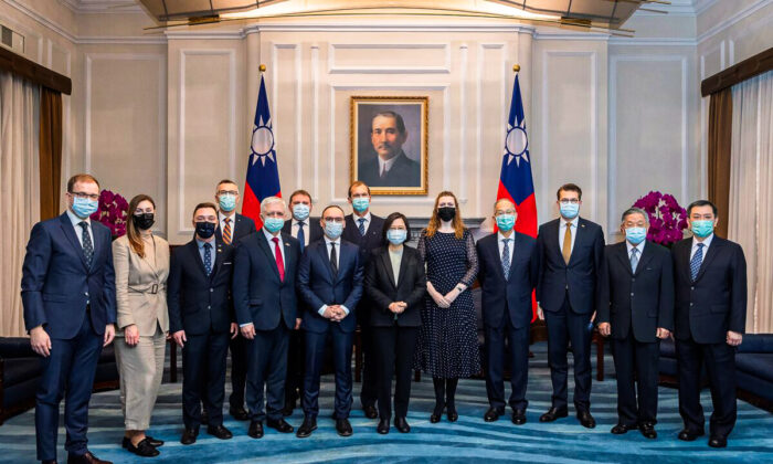 Taiwanese President Tsai Ing-wen (C) with a delegation from the Baltic States at the Presidential Office in Taipei, Taiwan on Nov. 29, 2021. (Taiwan Presidential Office via AP)