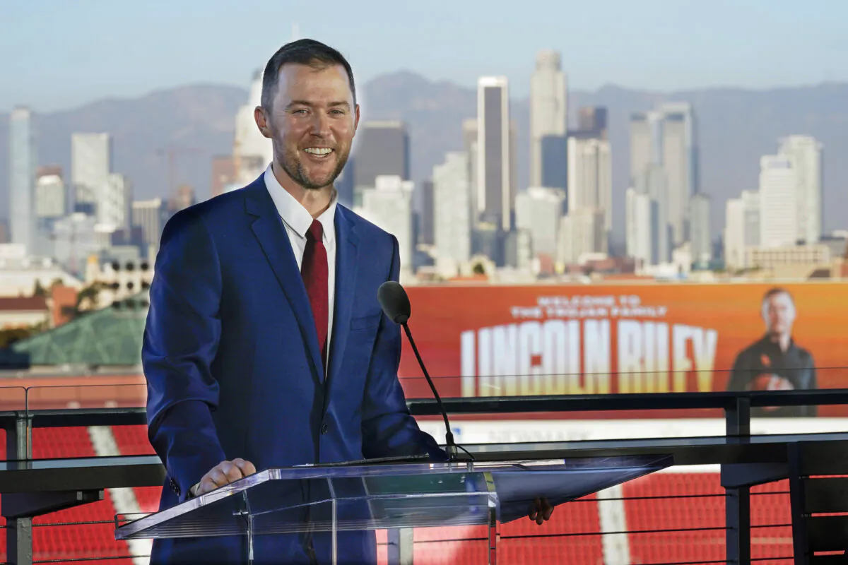 Lincoln Riley, the new head football coach of the University of Southern California, speaks during a ceremony in Los Angeles on Monday Nov. 29, 2021. (Ashley Landis/AP Photo)