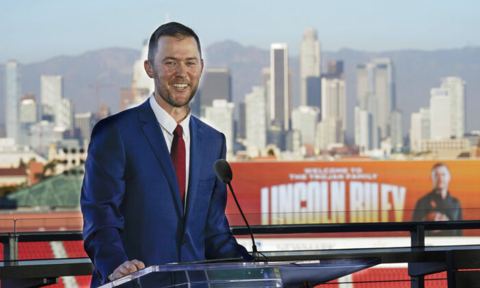 Lincoln Riley, the new head football coach of the University of Southern California, speaks during a ceremony in Los Angeles on Monday Nov. 29, 2021. (Ashley Landis/AP Photo)