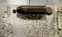 Michigan Family Find WWI-Era Artillery Shell Filled With Antique Coins While Cleaning House