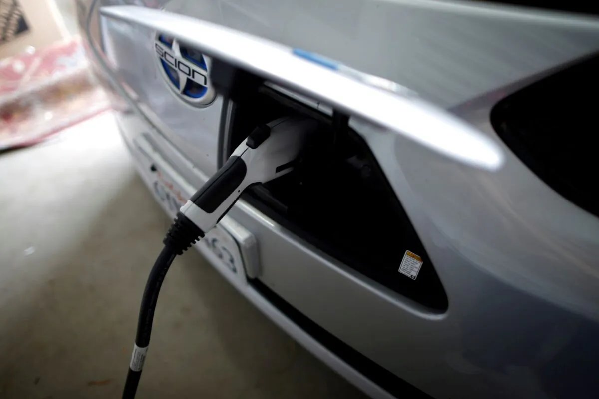 A computer science professor's electric car is recharging in her garage in Irvine, Calif., on Jan. 26, 2015. (Lucy Nicholson/Reuters)
