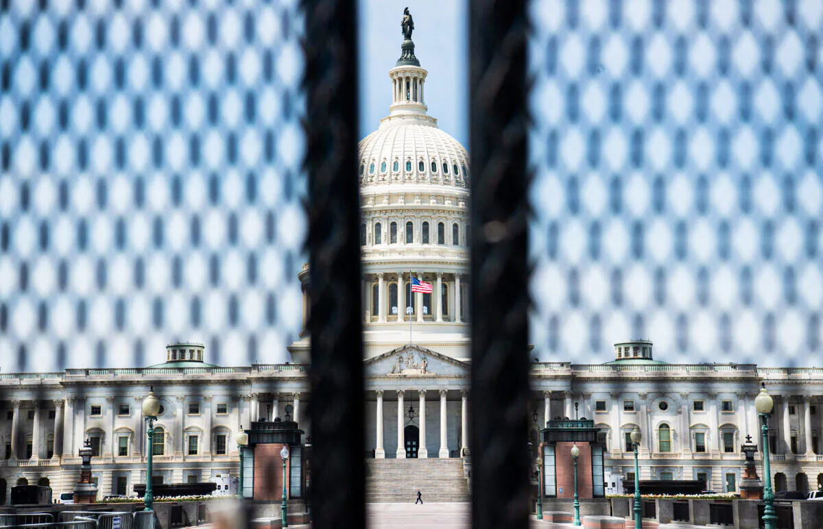 A tall security fence surrounds the US Capitol ahead of US President Joe Bidens address to a joint session of Congress in Washington, on April 28, 2021. (Saul Loeb/AFP via Getty Images)