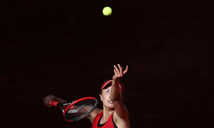 China's Peng Shuai in action against Spain's Garbine Muguruza during their round of 64 match in Madrid, Spain on May 6, 2018. (Susana Vera/Reuters)