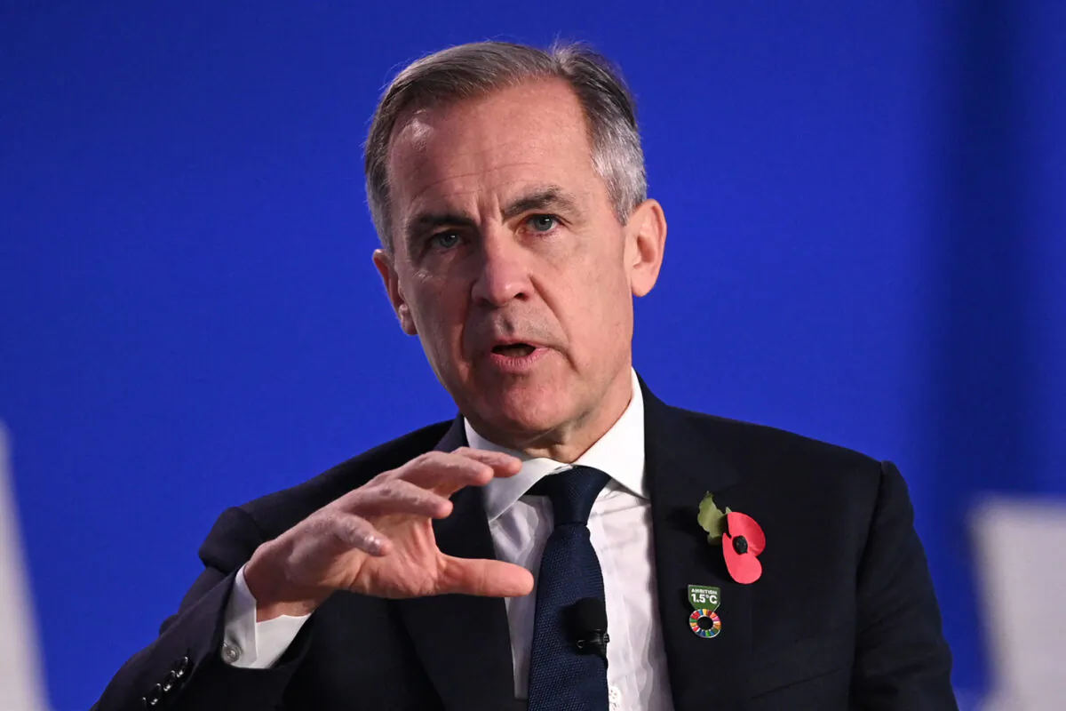 Mark Carney, former governor of both the Bank of Canada and Bank of England, and U.N. special envoy for climate action and finance, attends the opening of Finance Day at the COP26 U.N. climate summit in Glasgow, Scotland, on Nov. 3, 2021. (Daniel Leal/AFP via Getty Images)