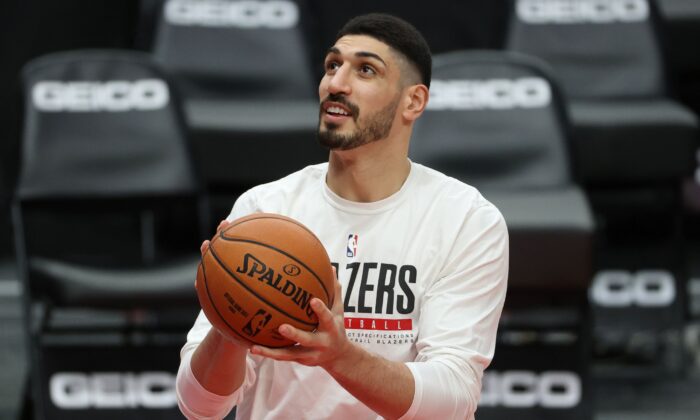 Enes Kanter (#11) of the Portland Trail Blazers warms up at Moda Center in Portland, Ore., on Feb. 20, 2021. (Abbie Parr/Getty Images)