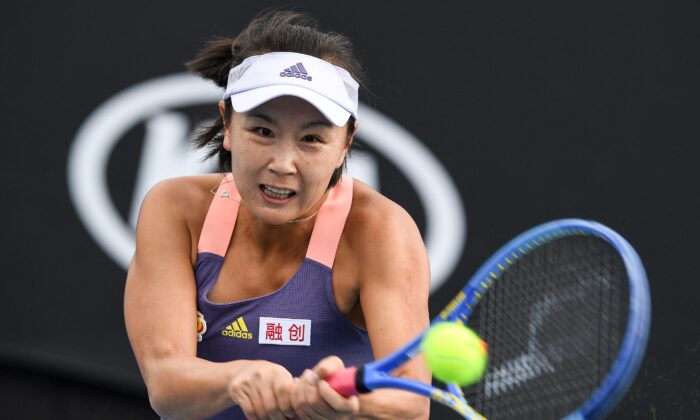 China's Peng Shuai hits a return against Japan's Nao Hibino during their women's singles match on day two of the Australian Open tennis tournament in Melbourne on Jan. 21, 2020. (Greg Wood/AFP via Getty Images)