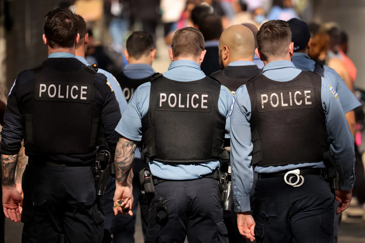 Chicago police officers patrol downtown as the city celebrates the Chicago Sky's WNBA title on Oct. 19, 2021, in Chicago, Illinois. (Scott Olson/Getty Images)