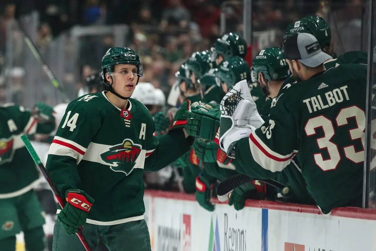 Minnesota Wild center Joel Eriksson Ek (14) celebrates with teammates after scoring a goal against the Arizona Coyotes in the first period at Xcel Energy Center in Saint Paul, Minn., on Nov. 30. 2021. (David Berding/USA TODAY Sports via Field Level Media)