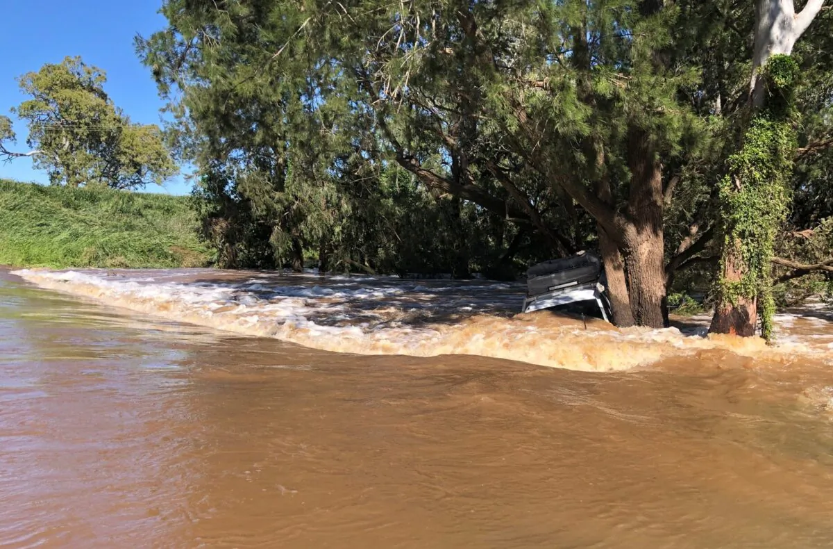 A ute submerged in floodwaters in Queensland, Australia, Nov. 25, 2021. (Supplied by Queensland Fire and Emergency Services) 